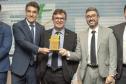 A Portos do Paraná foi eleita pela melhor gestão portuária do País pelo terceiro ano consecutivo. O reconhecimento foi feito pelo governo federal na terceira edição do Prêmio “Portos + Brasil”, entregue na noite desta quinta-feira (23), pelo Ministério da Infraestrutura, em Brasília. Entre todos os portos públicos brasileiros, os paranaenses (Paranaguá e Antonina) alcançaram a nota máxima no Índice de Gestão das Autoridades Portuárias (IGAP): 100 pontos. O indicador é considerado o mais importante para ate
