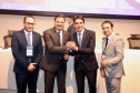 homens posando com o Troféu PAINEL 2024