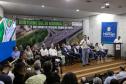 Governador, Ratinho Júnior, falando de cima de um palco
