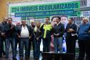 Secretario de Infraestrutura e Logística falando de cima do palco