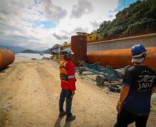 trabalhadores na pobra da ponte